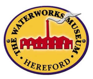 The Waterworks Museum Hereford logo, red building silhouette on yellow circular background